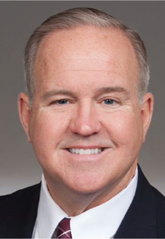 A photograph of Robert E. Butler, D.D.S.