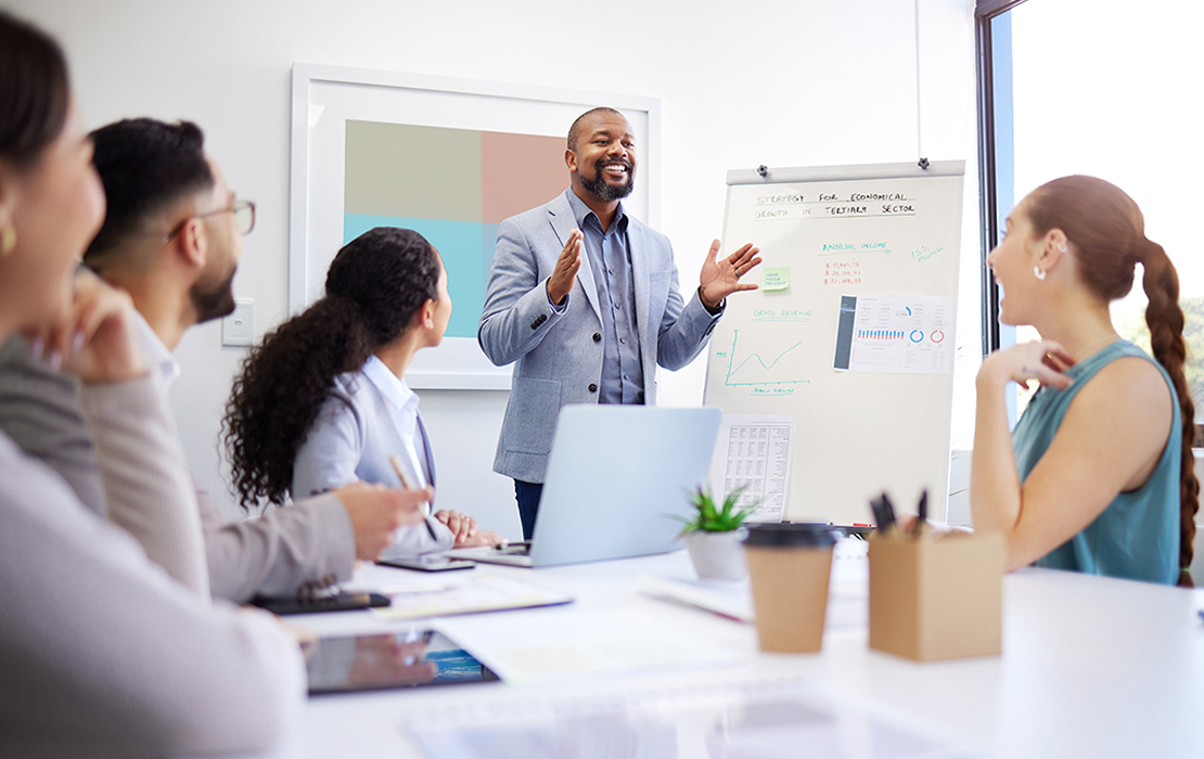 Group of attendees listening to a speaker