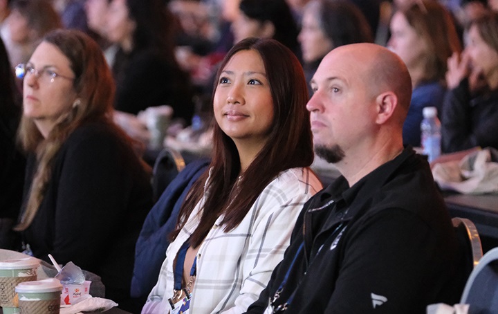 Image of attendees at a speaking event