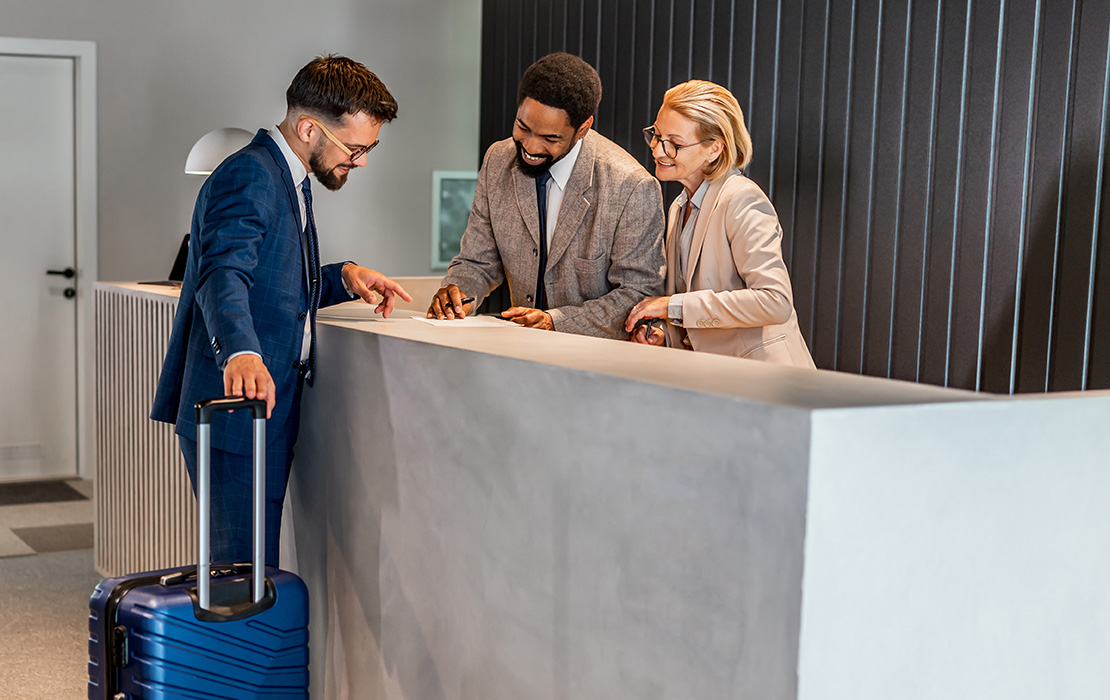 Person checking in at front desk.