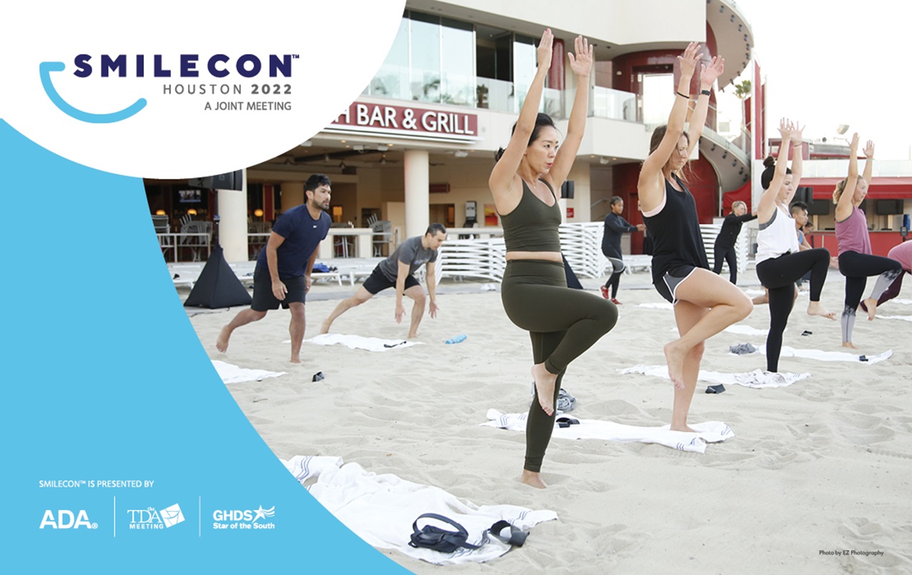 Image of beach wellness session SmileCon™ 2022.