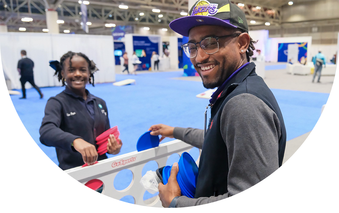 Father and son playing large size Connect Four