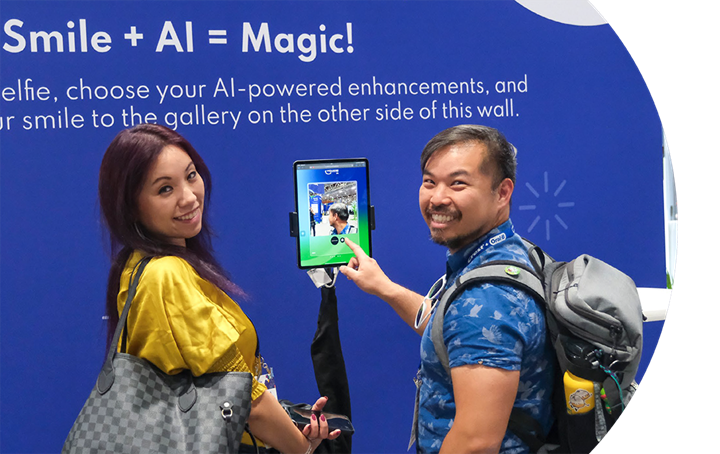 Two attendees 'Smile + AI = Magic!'