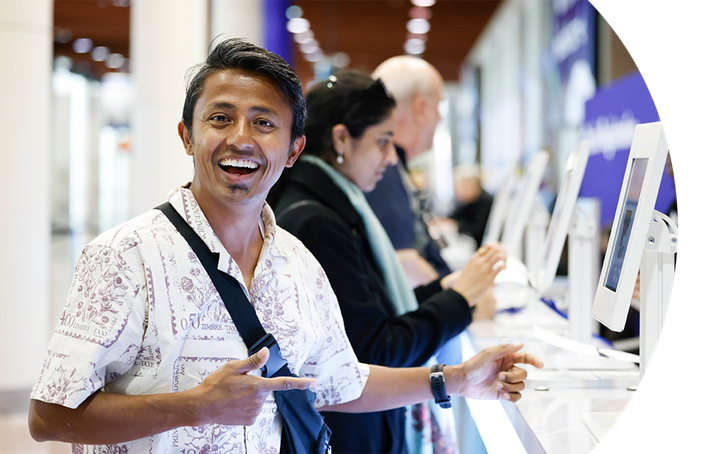 Attendee registering at computer station