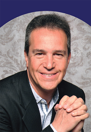 A photographic portrait of ADA Smilecon 2022 scheduled speaker, Dr. Luis Karakowsky