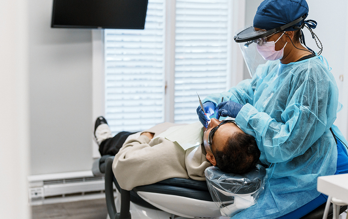 A patient receiving care for adult pain guidelines