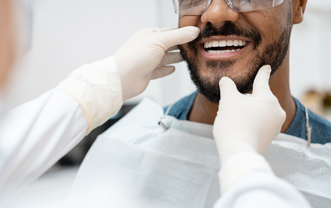 Person receiving dental check up
