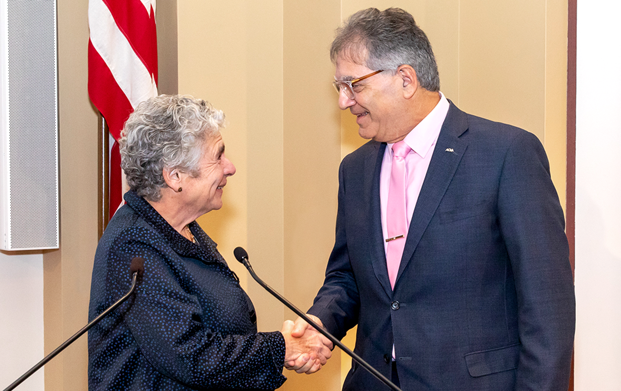 Image of a handshake to introduce ADA Forsyth Institute