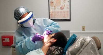 Photo of Dr. Rondeno and patient