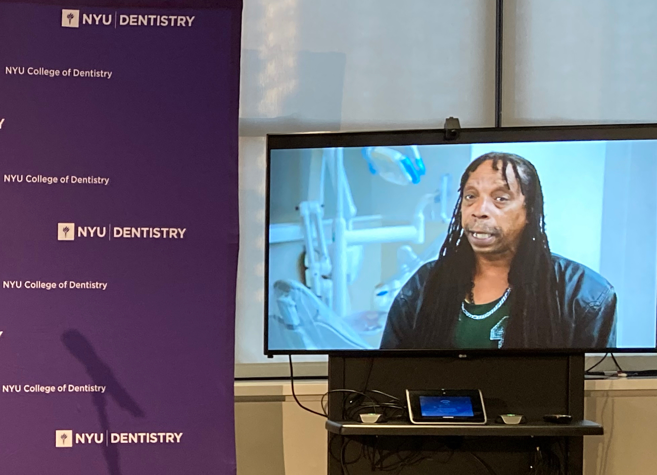 Veteran Ray Leonard delivers a video message during NYU VETSmile launch