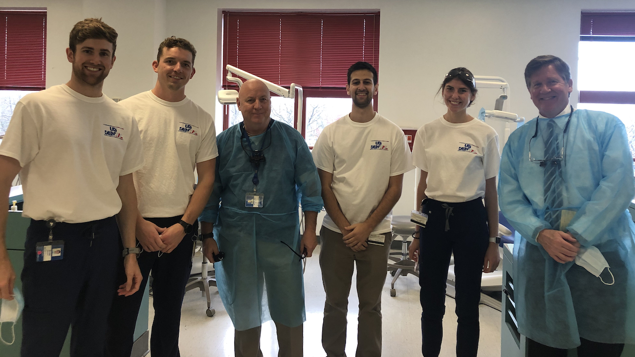 University of Buffalo School of Dental Medicine faculty and students during a 2021 veterans event at the school