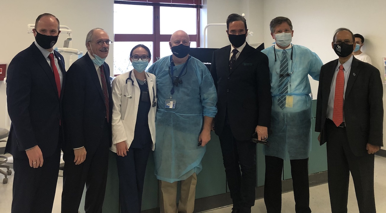 NY State Senator Tim Kennedy, Dean Joe Zambon, Ray Miller, Brendan Dowd and Rep. Brian Higgins during a veterans dental event at University of Buffalo.