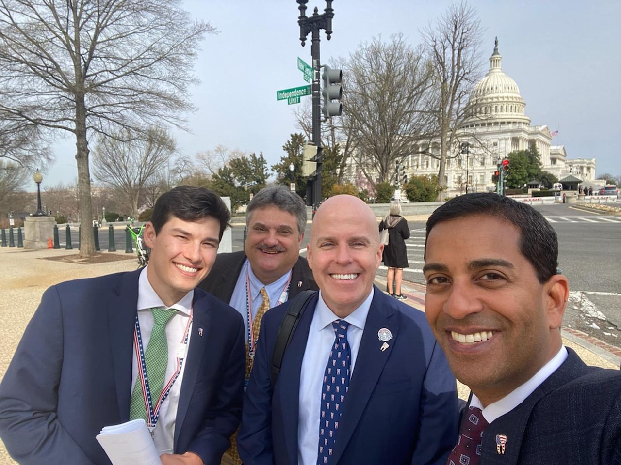 Photo of dental student Ty Smith, Dr. Dan Gesek, FDA Executive Director Drew Eason and Dr. Zack Kalarickal.