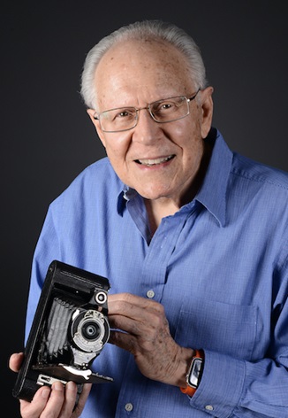 Photo of Ronald E. Goldstein, D.D.S., with his camera