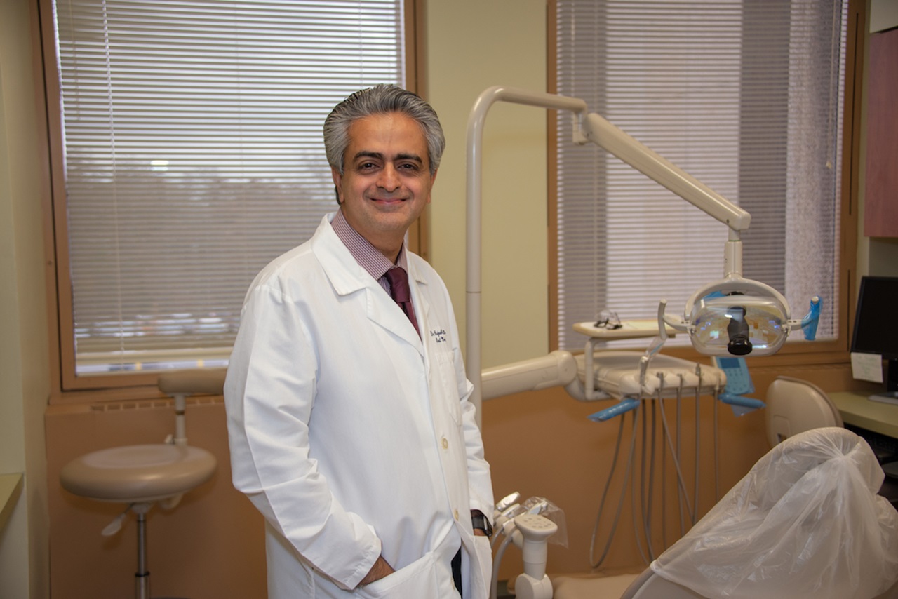 Photo of Dr. Lalla at UConn research center