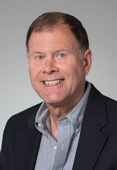 A photograph of Dennis McHugh