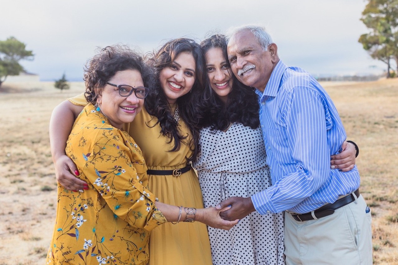 Photo of Dr. Venkatesh with sister, parents