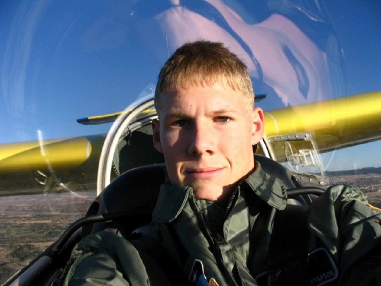 Photo of Dr. Gustafson in a glider plane