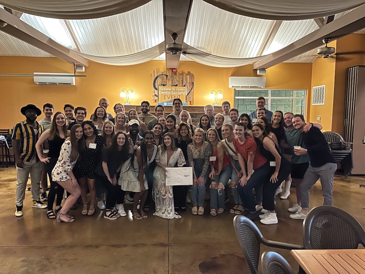 Photo of dental students at Greater St. Louis Dental Society event