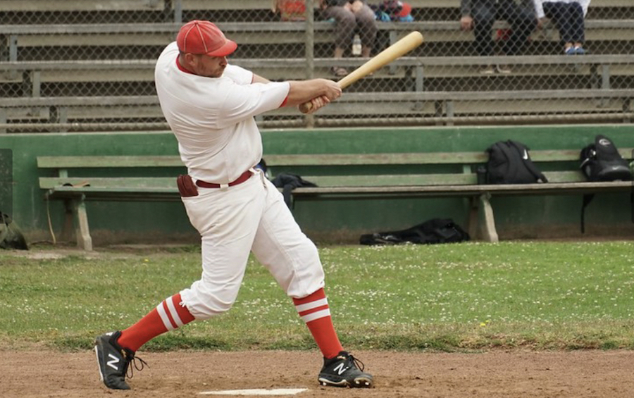 Photo of Dr. Bentley taking a swing