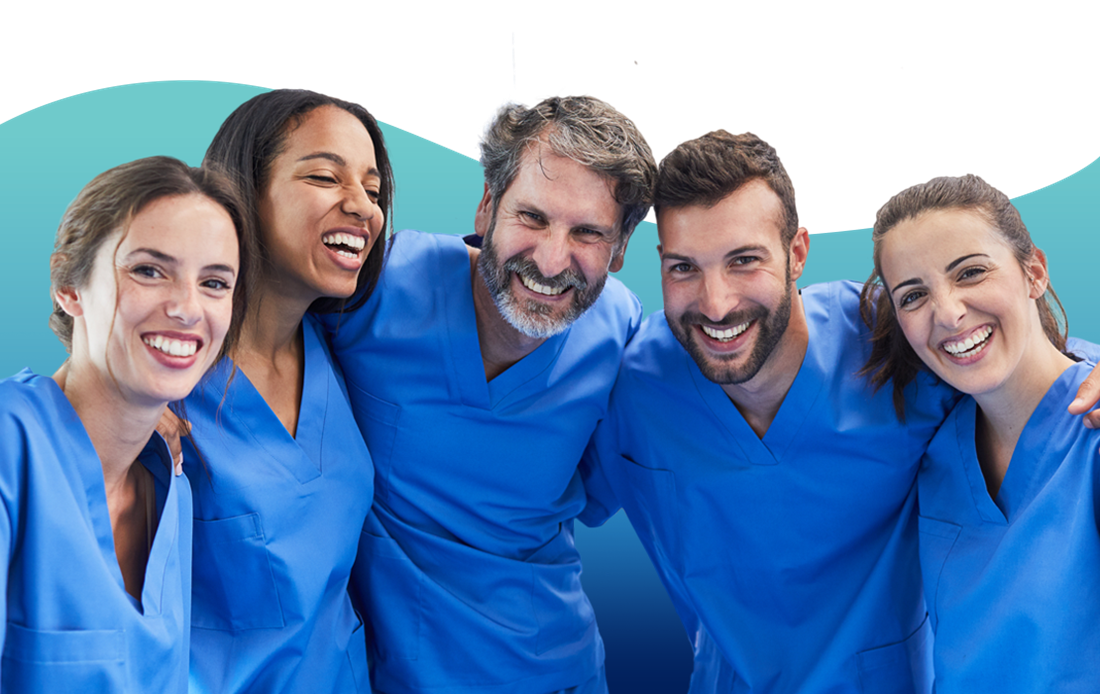 A photograph of dentists wearing scrubs.