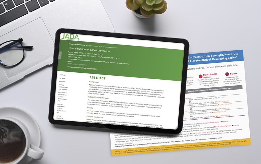 Fluoridation resources card and digital content on a tablet