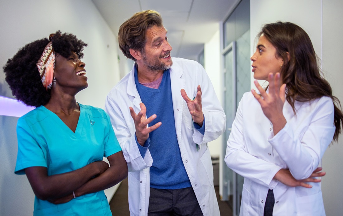 Three dentist talking