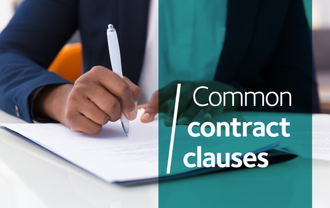 person writing a contract