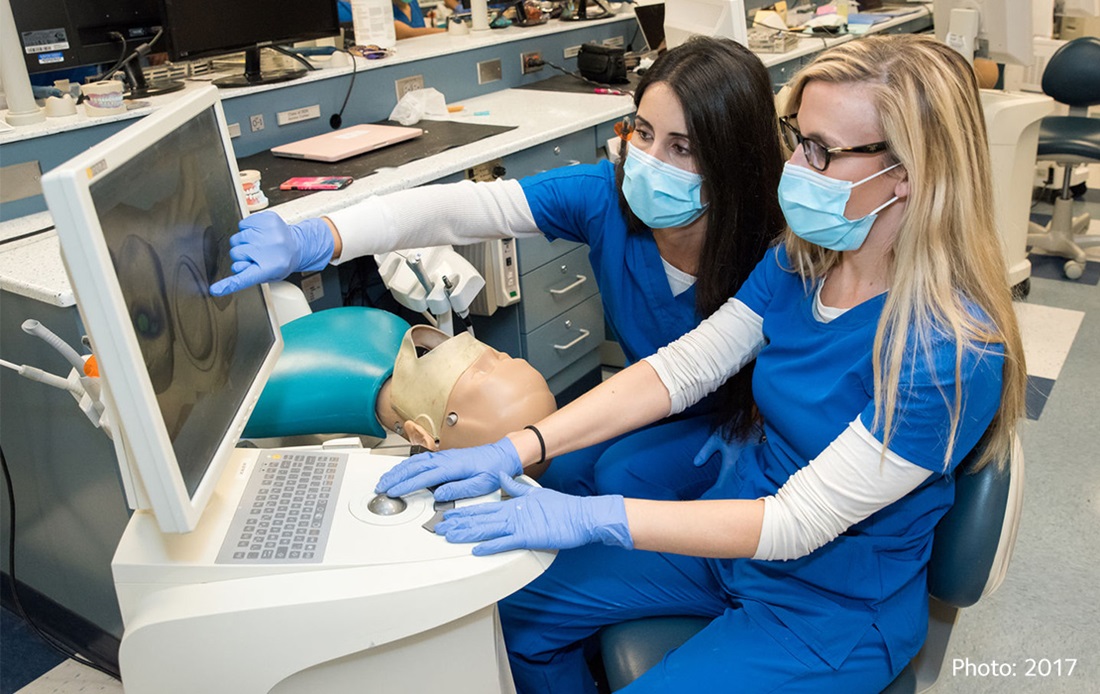 Dental students researching
