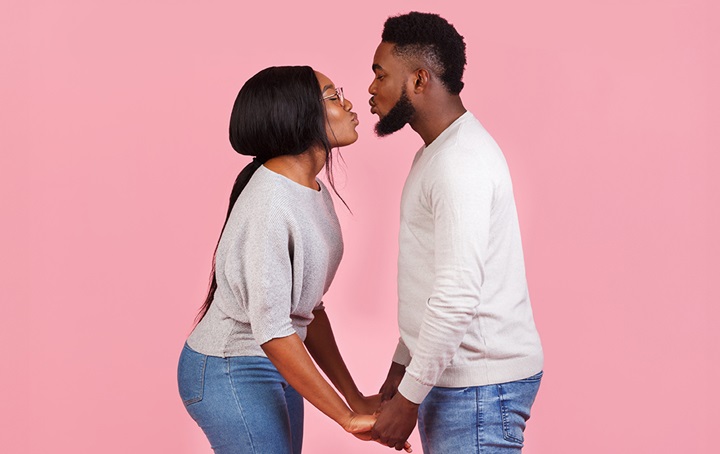 A couple about to kiss