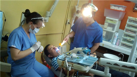 Clinicians working on patients on international mission trip