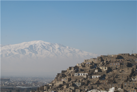 A view of a town and mountain