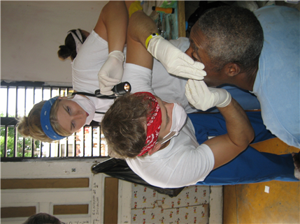 Dentists performing procedure on patient