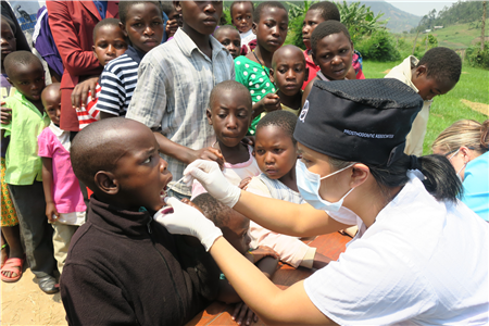 dentist screening patients in line