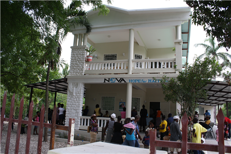 People waiting outside clinic 