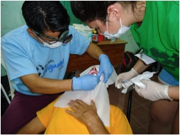 dentists treating patient