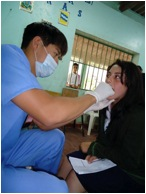 dentist examining young girl