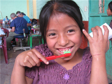 Small girl with toothbrush