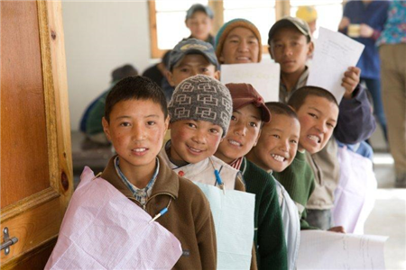 Children in line waiting for dental exams