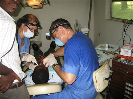 dental team tretaing patient