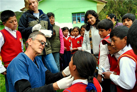 Dentist Examining Child in Peru