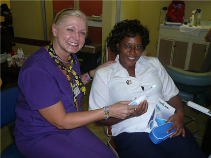 Dentist with Jamaican patient