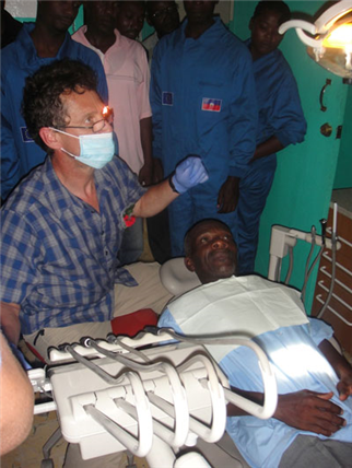 Dentist treating Haitian patient