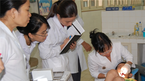 Local dentists treating boy