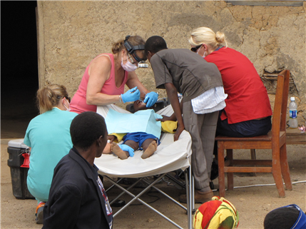 child on outside treatment table