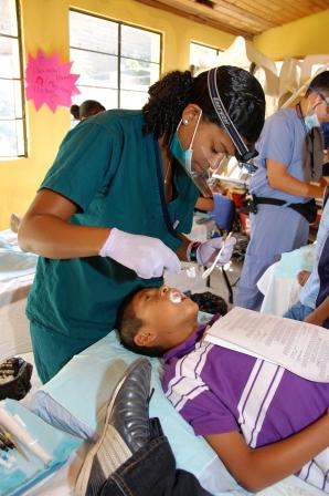 Dentist treating patient