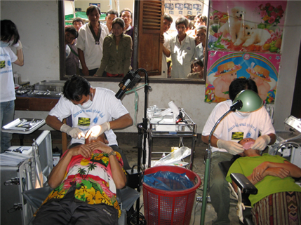 Two patients being treated in clinic in Laos