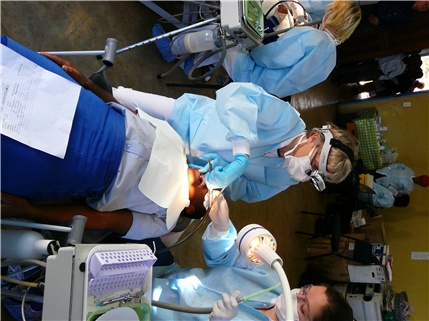 Dentists treating patient