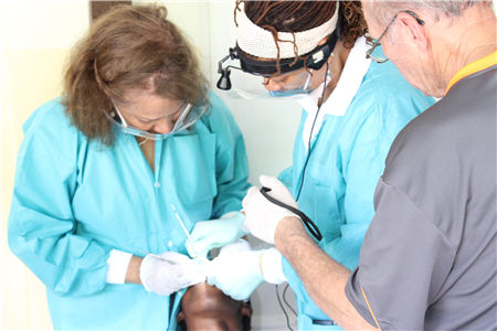 Clinicians treating haitian patient