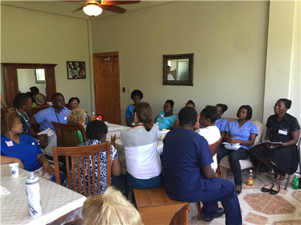 Clincians and volunteers in Dining Room